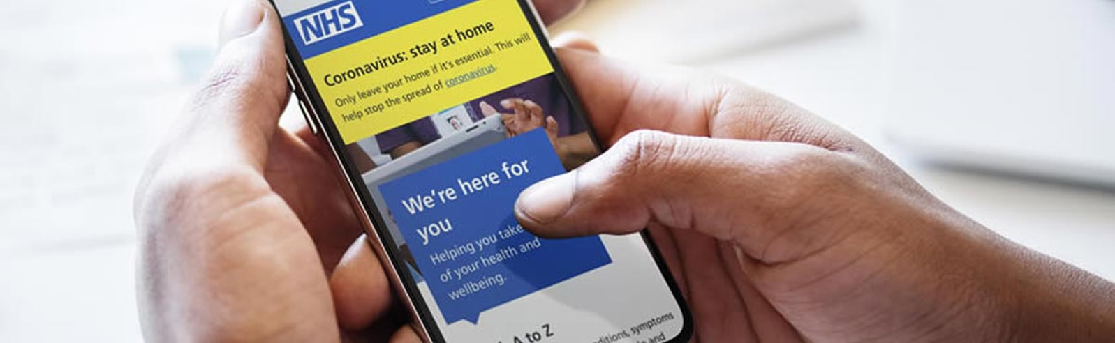 Someone searching for NHS services nearby on their smartphone