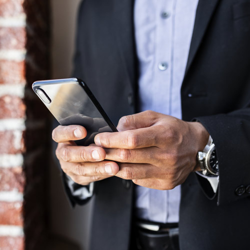 man using a mobile phone